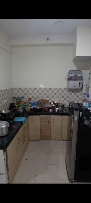 Kitchen in 2.5 BHK Apartment at Gaur City 6th Avenue, Sector 4 Greater Noida – for Rent