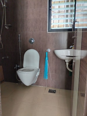 Bathroom in 2 BHK Apartment at Raunak Unnathi Woods, Ghodbunder Road – for Rent