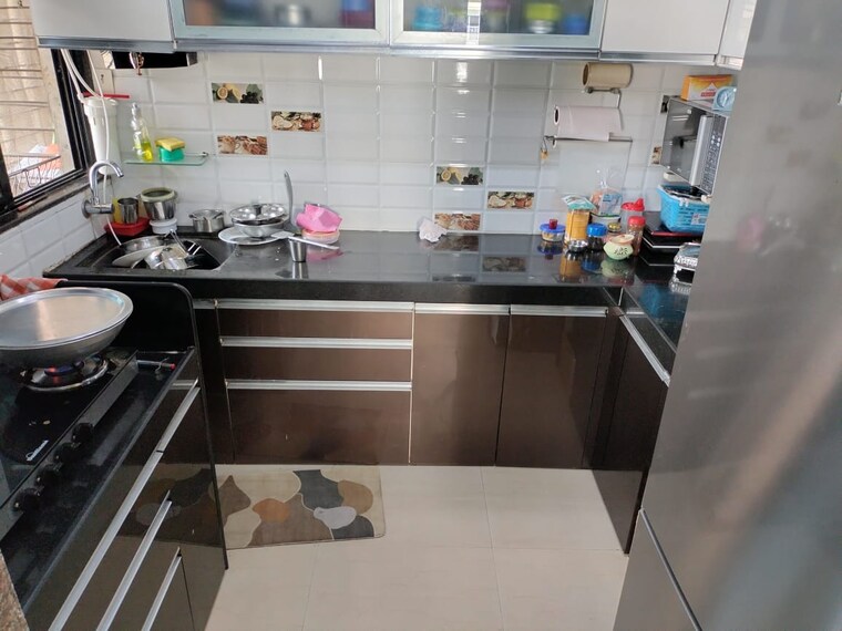 Kitchen, raunak-unnathi-woods 2 Bedroom 660 Sq.Ft. Apartment In Ghodbunder Road Thane 9502028