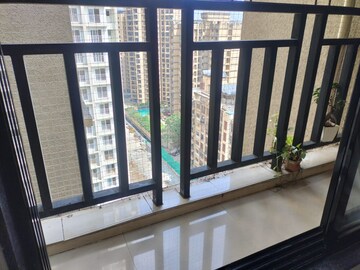 Balcony in 2 BHK Apartment at Raunak Unnathi Woods, Ghodbunder Road – for Rent