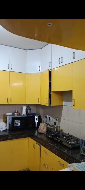 Kitchen in 3 BHK Apartment at Panchsheel Greens, Sector 16 Greater Noida – for Rent