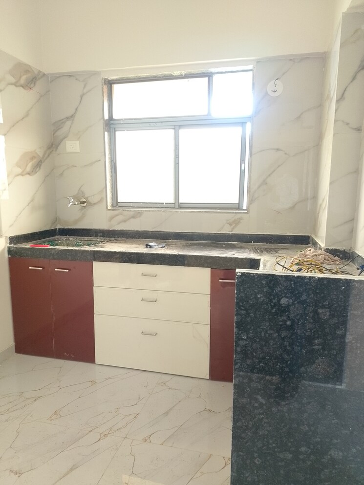 Kitchen, om-sai-heights-phase-ii 1 Bedroom 610 Sq.Ft. Apartment In Morya Nagar Palghar 9502438