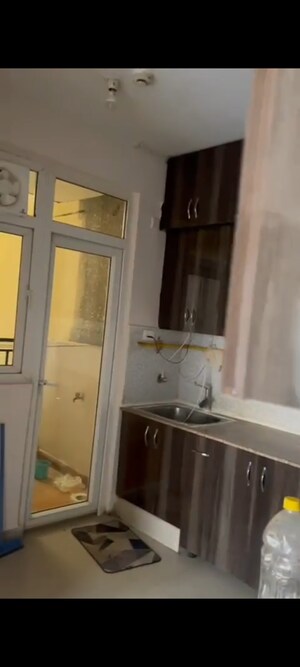 Kitchen in 3 BHK Apartment at Spring Meadows, Tech Zone 4 Greater Noida – for Rent