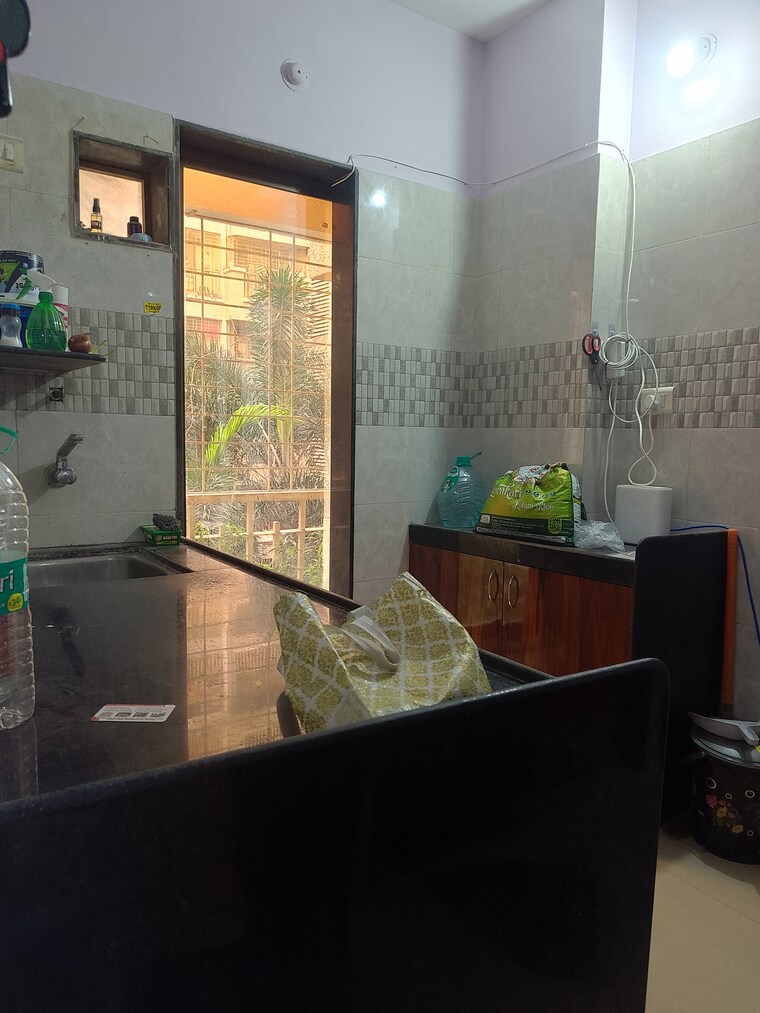 Kitchen, om-sai-heights-phase-ii 1 Bedroom 610 Sq.Ft. Apartment In Morya Nagar Palghar 9502827