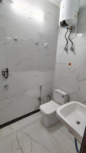 Bathroom in 3 BHK Builder Floor at Dwarka Mor – for Rent