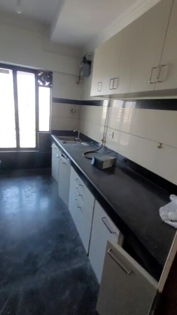 Kitchen in 2 BHK Apartment at Vanamali CHS, Chembur – for Rent