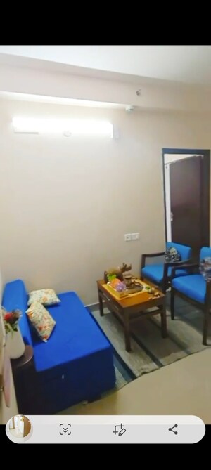 Living Room in 1 BHK Apartment at Amrapali Dream Valley, Tech Zone 4 Greater Noida – for Rent