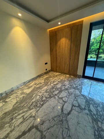 Bedroom in 4 BHK Builder Floor at Kailash Colony – for Sale