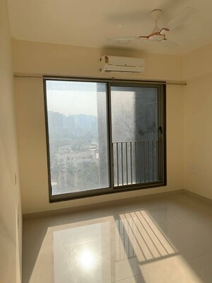 Room in 2 BHK Apartment at Sunteck City Avenue 4, Goregaon West – for Rent