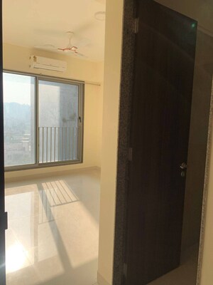 Room in 2 BHK Apartment at Sunteck City Avenue 4, Goregaon West – for Rent