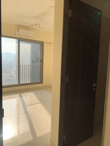 Room in 2 BHK Apartment at Sunteck City Avenue 4, Goregaon West – for Rent