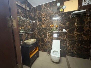 Bathroom in 3 BHK Apartment at Nehru Enclave – for Sale