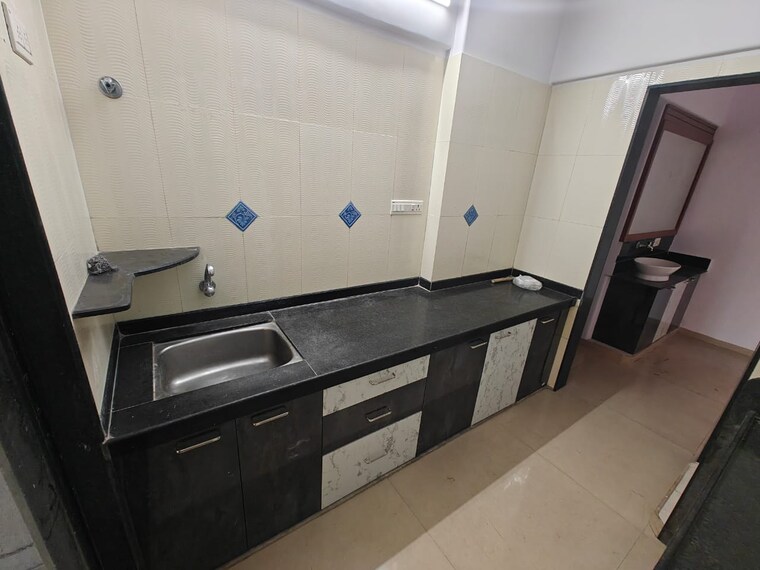 Kitchen, status-vihar 2 Bedroom 1100 Sq.Ft. Apartment In Kharghar Navi Mumbai 9503575