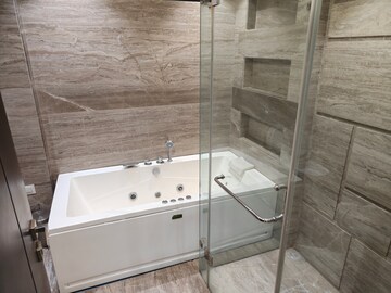 Bathroom in 5 BHK Builder Floor at Model Town Phase 1 – for Rent