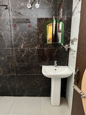 Bathroom in 3 BHK Apartment at NK Savitry Enclave, Vip Road – for Rent