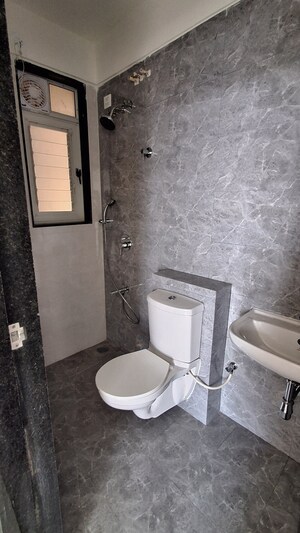 Bathroom in 2 BHK Apartment at Ajmera Crosstown One, Kalyan West – for Rent