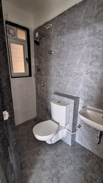 Bathroom in 2 BHK Apartment at Ajmera Crosstown One, Kalyan West – for Rent