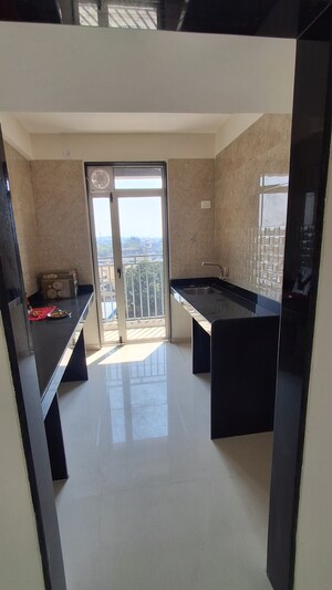 Kitchen in 2 BHK Apartment at Ajmera Crosstown One, Kalyan West – for Rent