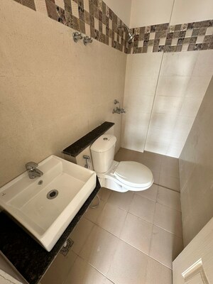 Bathroom in 3 BHK Apartment at Sushma Valencia, International Airport Road – for Rent
