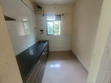 Building Lobby in 1 BHK Apartment at Raunak Unnathi Greens, Kasarvadavali – for Rent
