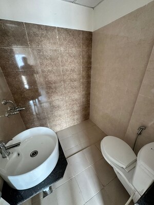 Bathroom in 3 BHK Apartment at Sushma Valencia, International Airport Road – for Rent