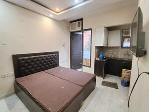 Bedroom in 1 RK Builder Floor at Queens Plaza, Sector 43 – for Rent