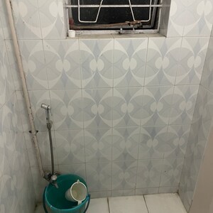 Bathroom in 2 BHK Apartment at Sharad Vaibhav, Model Colony – for Rent