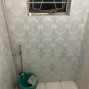 Bathroom in 2 BHK Apartment at Sharad Vaibhav, Model Colony – for Rent