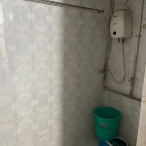 Bathroom in 2 BHK Apartment at Sharad Vaibhav, Model Colony – for Rent