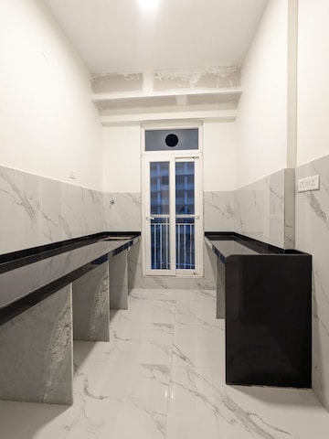 Kitchen in 2 BHK Apartment at Ruparel Sky Green, Kandivali West – for Sale