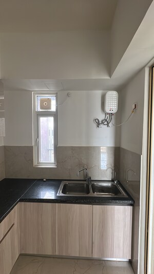 Kitchen in 3 BHK Apartment at Smart World Orchard, Sector 61 – for Rent