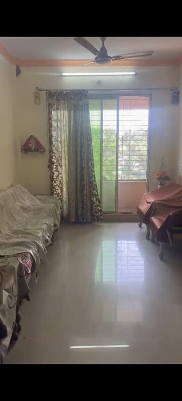 Living Room in 2 BHK Apartment at Umiya Uma Paradise Complex, Titwala – for Sale
