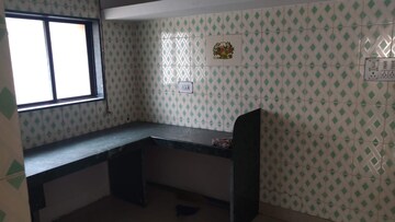 Kitchen in 2 BHK Apartment at Suvarna Smruti Apartments, Baner – for Rent