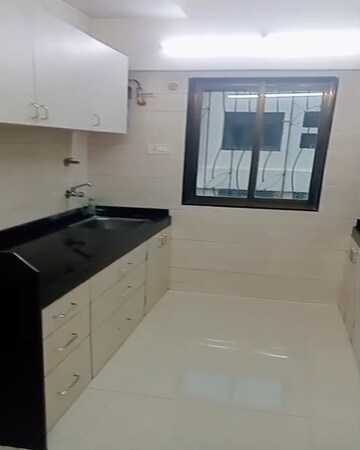 Kitchen in 2 BHK Apartment at Om Shakti CHS Chembur, Chembur – for Sale