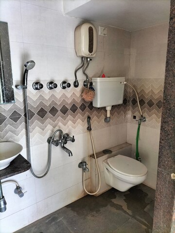Bathroom in 2 BHK Apartment at Poonam Park View, Virar West – for Rent