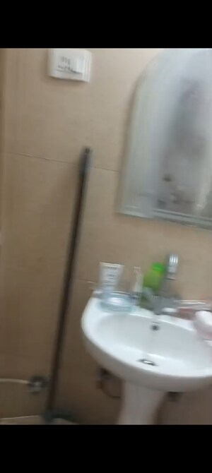 Bathroom in 2 BHK Apartment at Nilaya Greens, Raj Nagar Extension – for Sale