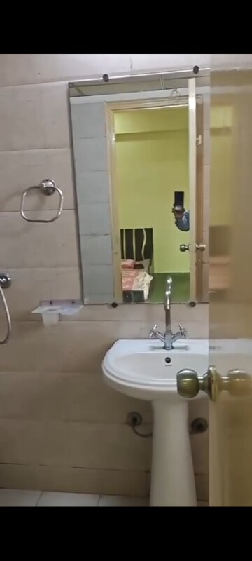 Bathroom in 3 BHK Apartment at Gaur City 6th Avenue, Sector 4 Greater Noida – for Rent