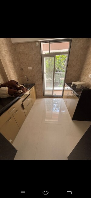 Kitchen in 2 BHK Apartment at Globle Bhaskar Residency, Narpoli – for Rent