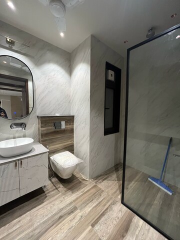 Bathroom in 4 BHK Builder Floor at Ansal Sushant Lok I, Sector 43 – for Rent