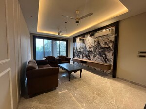 Living Room in 4 BHK Builder Floor at Ansal Sushant Lok I, Sector 43 – for Rent