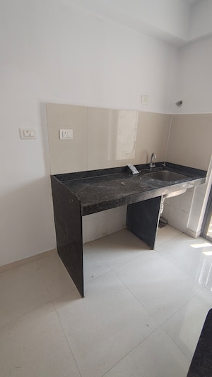 Team Area in 1 BHK Apartment at Lodha Lakeshore Greens, Dombivli East – for Rent