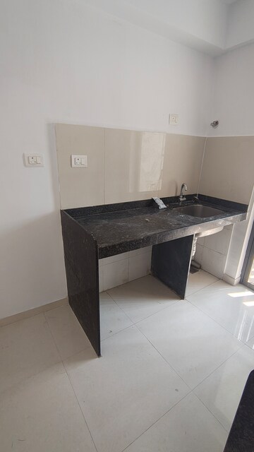 Team Area in 1 BHK Apartment at Lodha Lakeshore Greens, Dombivli East – for Rent