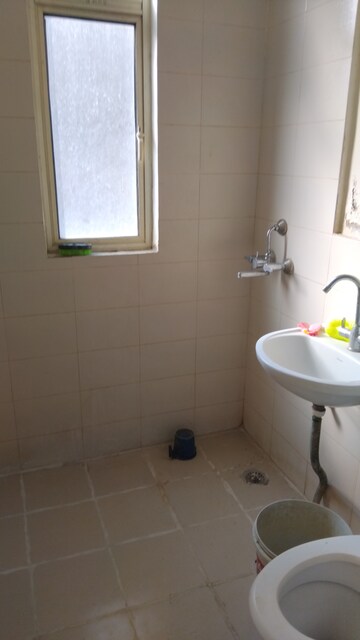 Bathroom in 2 BHK Apartment at Conscient Habitat 78, Sector 78 – for Rent