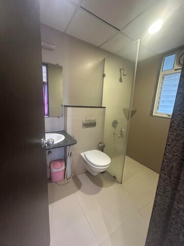 Bathroom in 3 BHK Apartment at Kolte Patil Tuscan Estate, Kharadi – for Rent