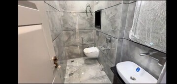 Bathroom in 4 BHK Builder Floor at Dwarka Mor – for Sale