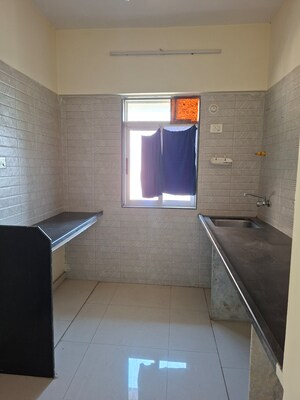 Kitchen in 1 BHK Apartment at Vihang Valley Phase 3, Kasarvadavali – for Sale