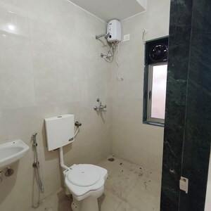 Bathroom in 1 BHK Apartment at Paradigm Zenith Pushpanjali Residency Phase III, Ghodbunder Road – for Rent