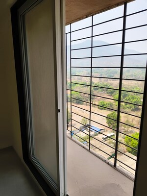 Balcony in 1 BHK Apartment at Mahavir Kalpavruksha, Ghodbunder Road – for Sale