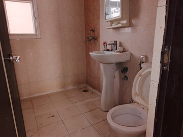 Bathroom in 3 BHK Apartment at Samridhi Grand Avenue, Tech Zone 4 Greater Noida – for Rent