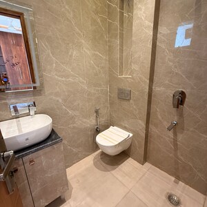 Bathroom in 4 BHK Apartment at Kailash Nath Adishwar Apartment, Pataudi House – for Rent